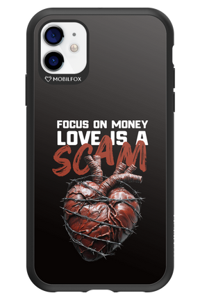 Focus on money, love is a scam - Apple iPhone 11